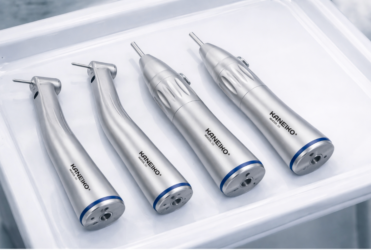 Set of Kaneiko dental low speed handpieces on a white tray