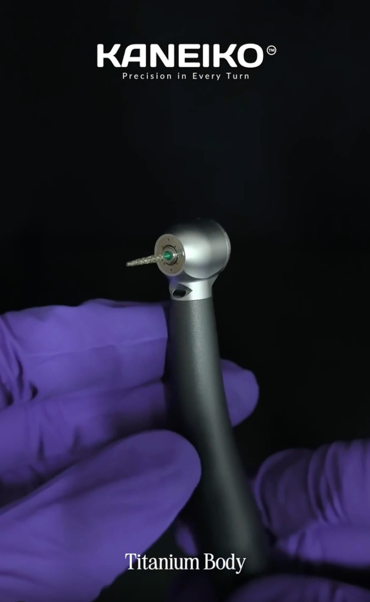 Kaneiko Master Torque Model M9K dental handpiece product video showing its titanium body, push-button chuck, four-port water mist cooling system and 360-degree rotating quick coupling.
